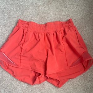 Lululemon Coral colored athletic shorts